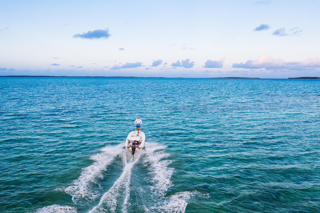 Boat running through the ocean.