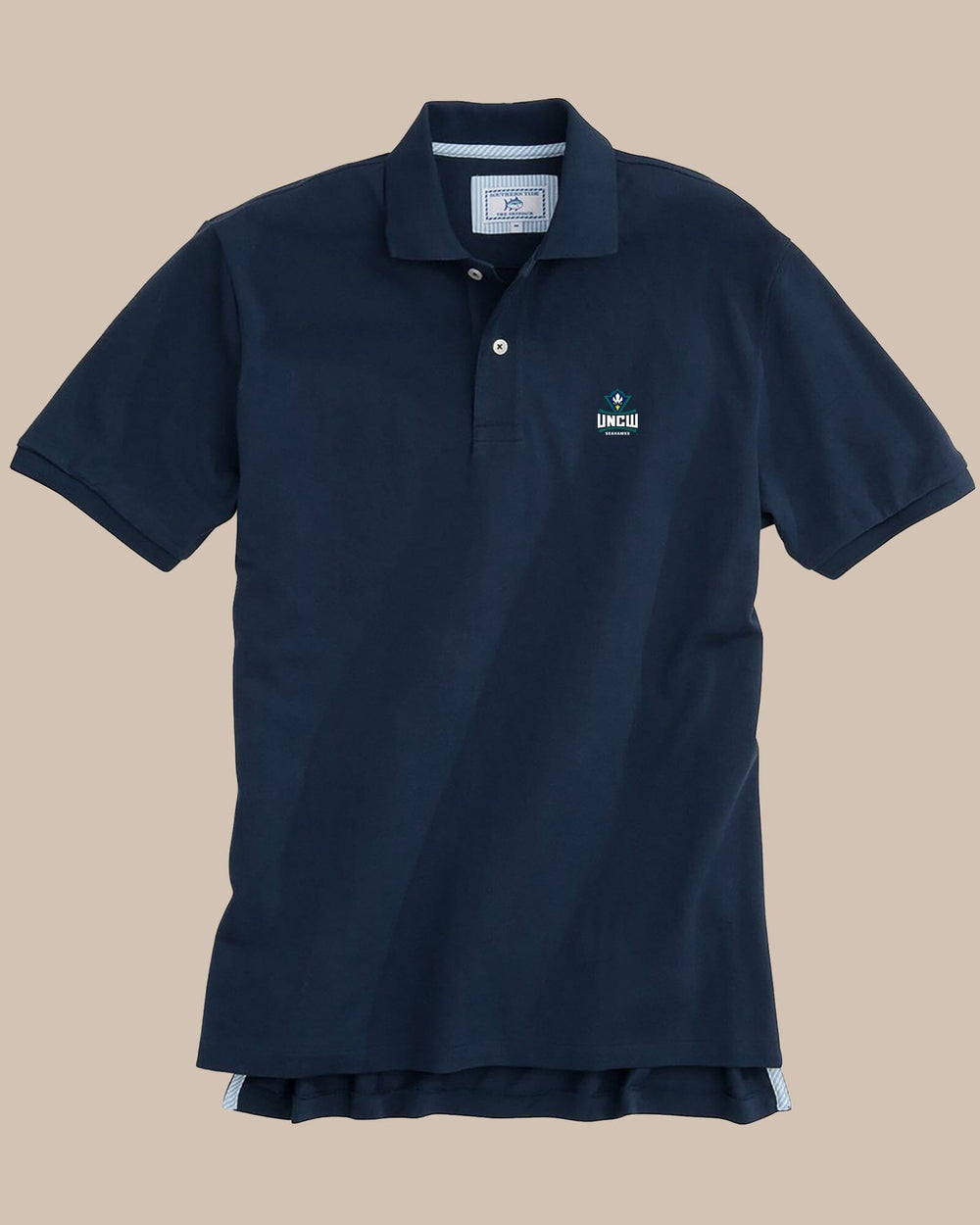 The front view of the North Carolina Wilmington Pique Polo Shirt by Southern Tide - Navy