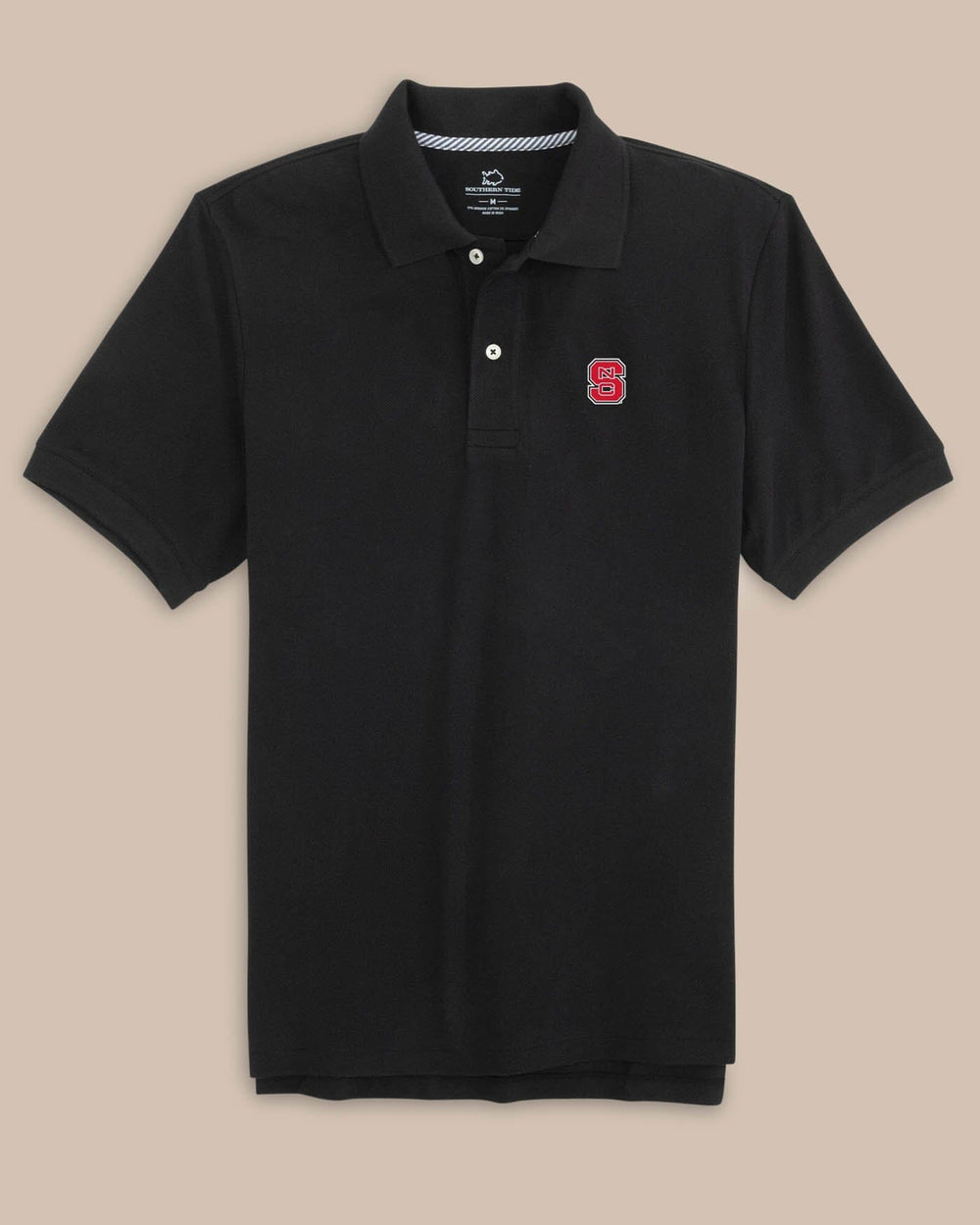 The front view of the NC State Wolfpack New Short Sleeve Skipjack Polo by Southern Tide - Black