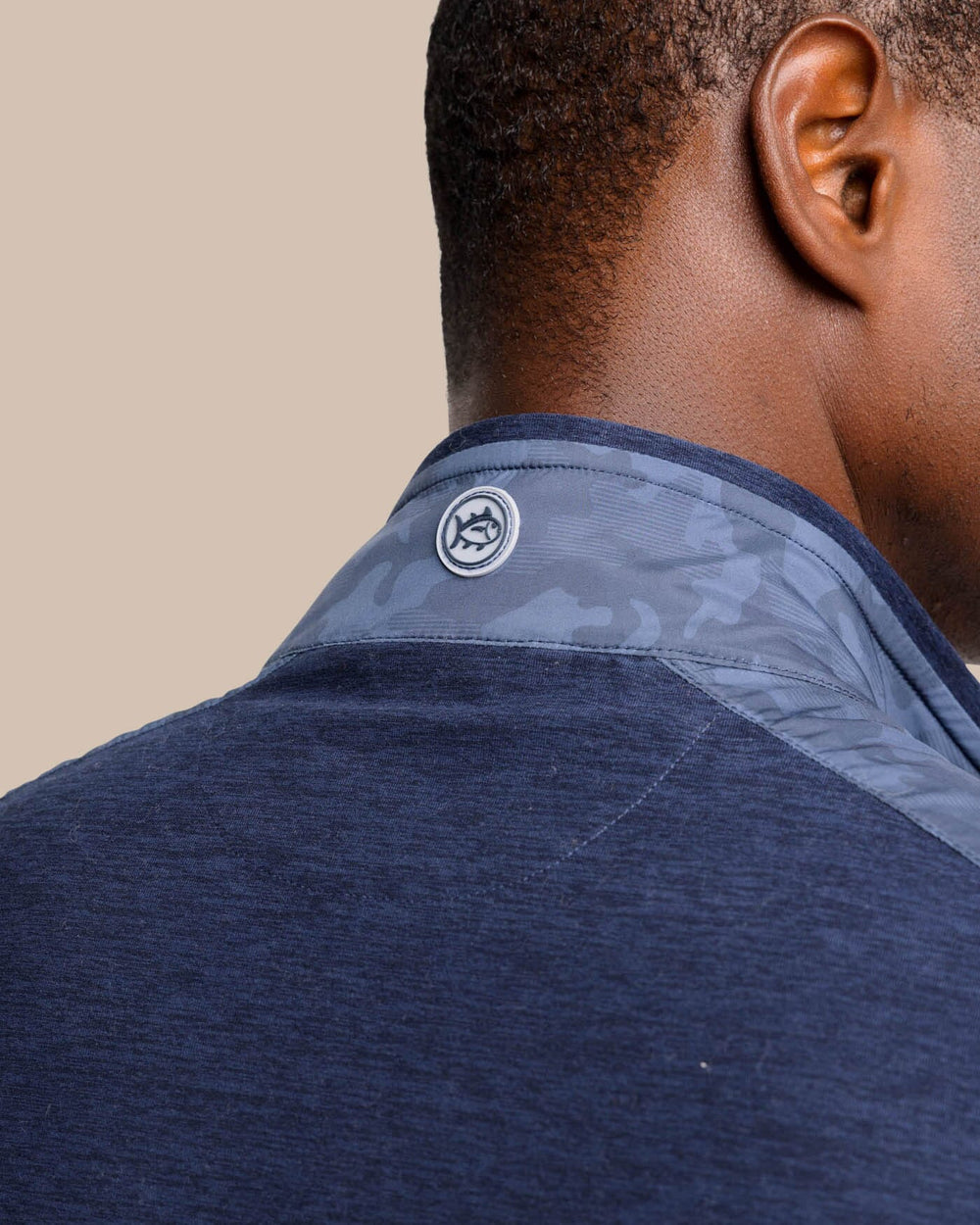 The back detail view of the Abercorn Camo Performance Vest by Southern Tide - True Navy