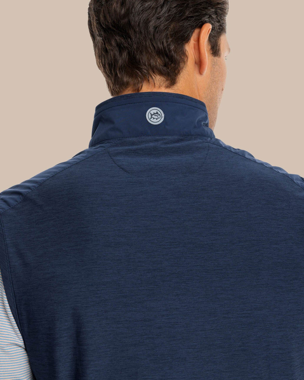 The model yoke view of the Men's Abercorn Performance Vest by Southern Tide - True Navy