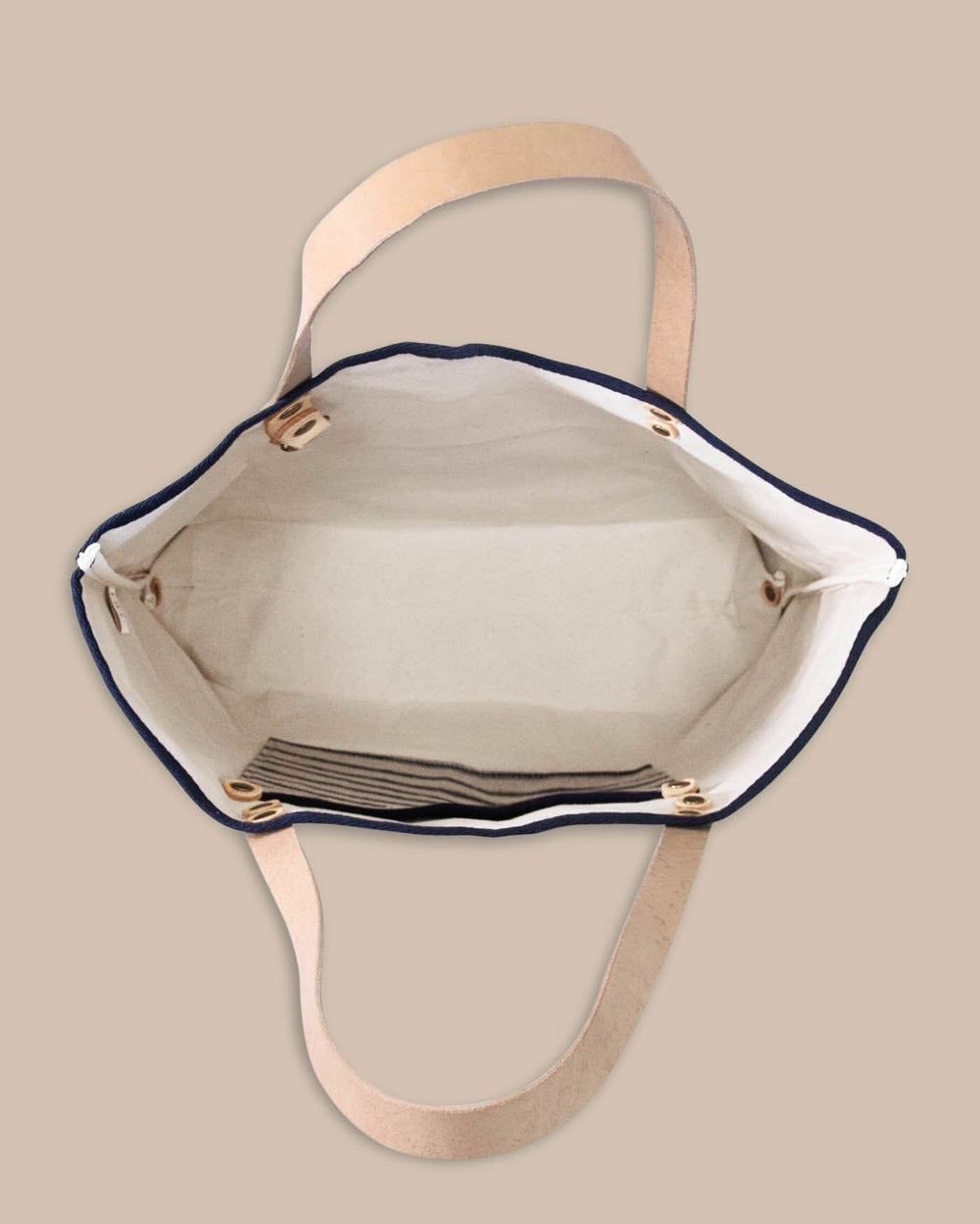 The detail view of the All Day Denim Tote by Southern Tide - Navy