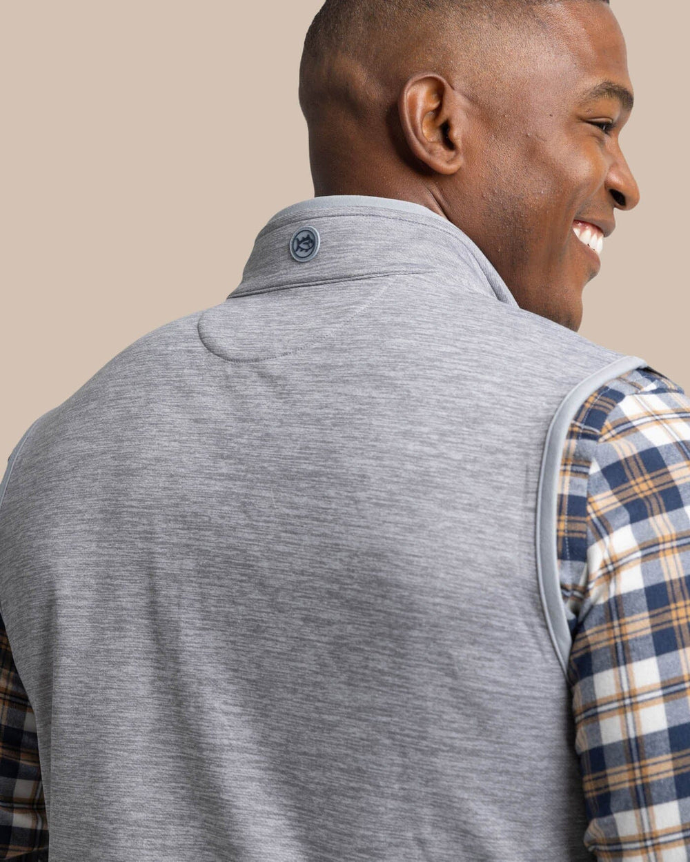 The back view of the Southern Tide Baybrook Heather Vest by Southern Tide - Heather Ultimate Grey