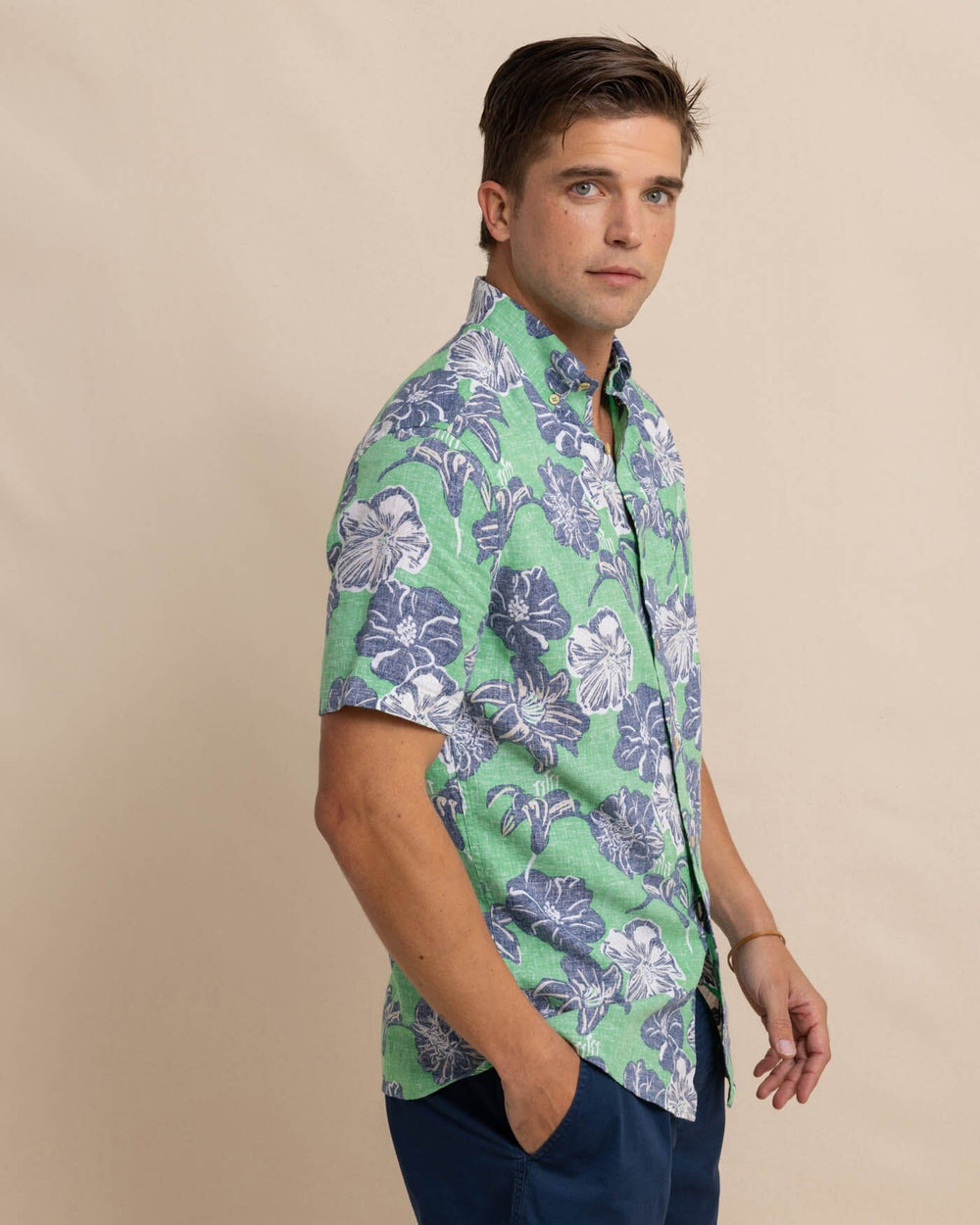 The front view of the Southern Tide Beach Blooms Linen Rayon Short Sleeve Sport Shirt by Southern Tide - Lawn Green