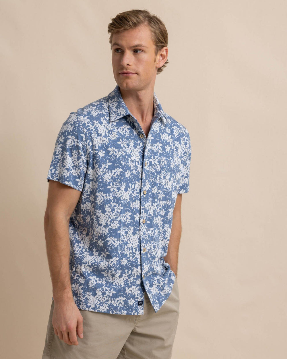 The front view of the Southern Tide Beachcast Island Blooms Knit Short Sleeve Sport Shirt by Southern Tide - Coronet Blue