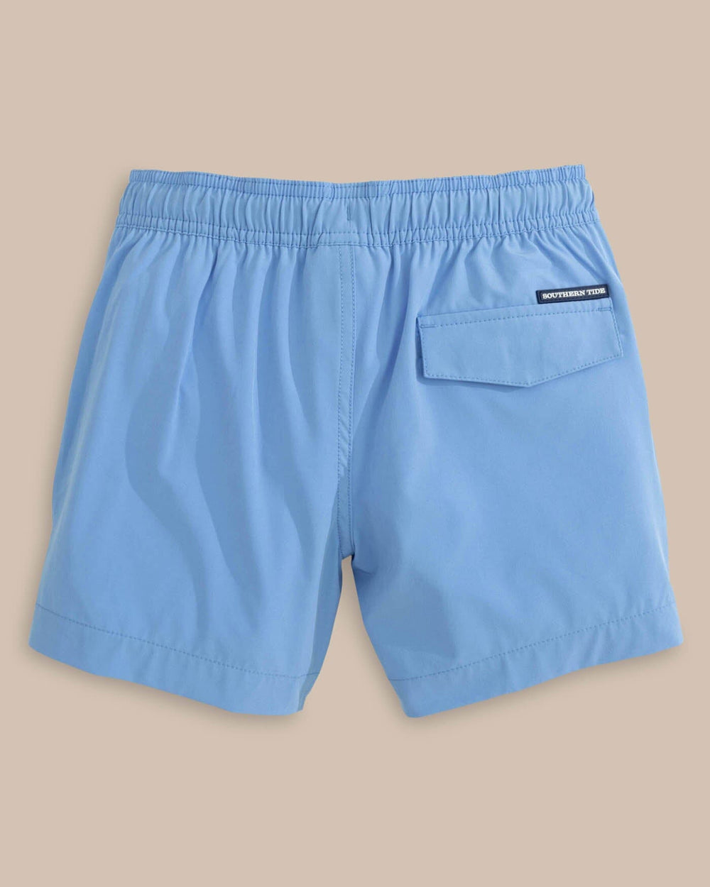 The back view of the Southern Tide Boys Solid Swim Truck 2 0 by Southern Tide - Ocean Channel
