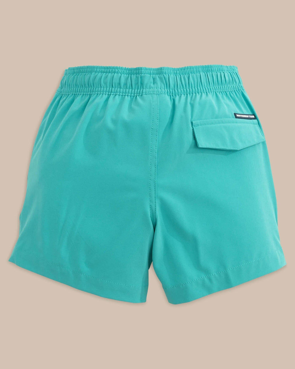 The back view of the Southern Tide Boys Solid Swim Truck 2 0 by Southern Tide - Tidal Wave