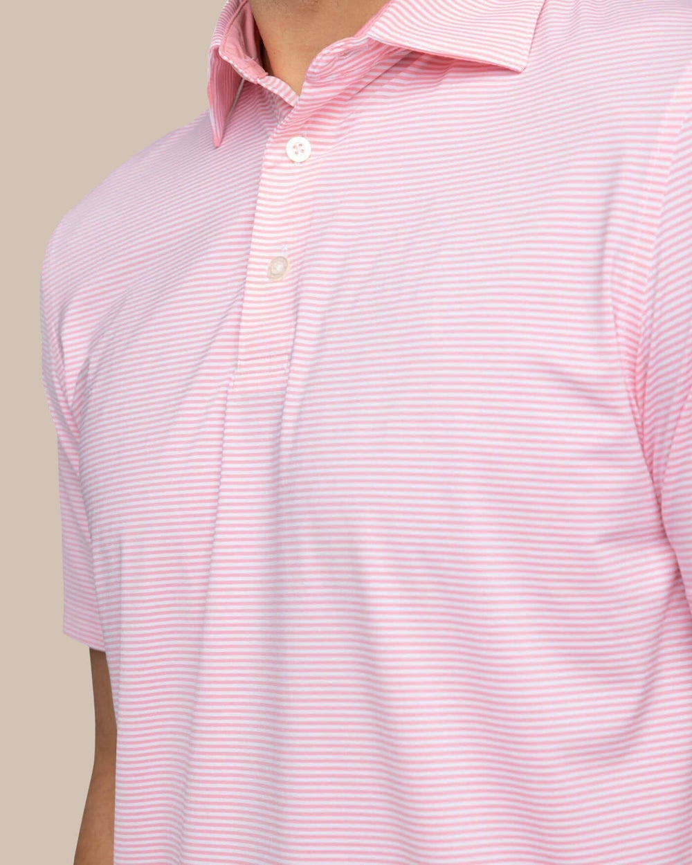 The detail view of the Southern Tide brrr-eeze Meadowbrook Stripe Polo by Southern Tide - Geranium Pink