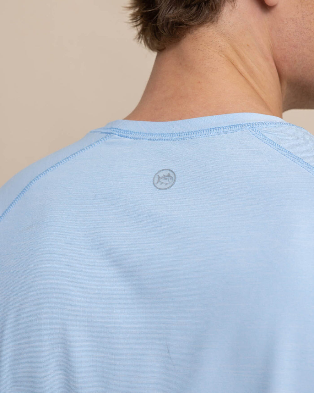 The detail view of the Southern Tide brrr illiant Performance T-Shirt by Southern Tide - Clearwater Blue