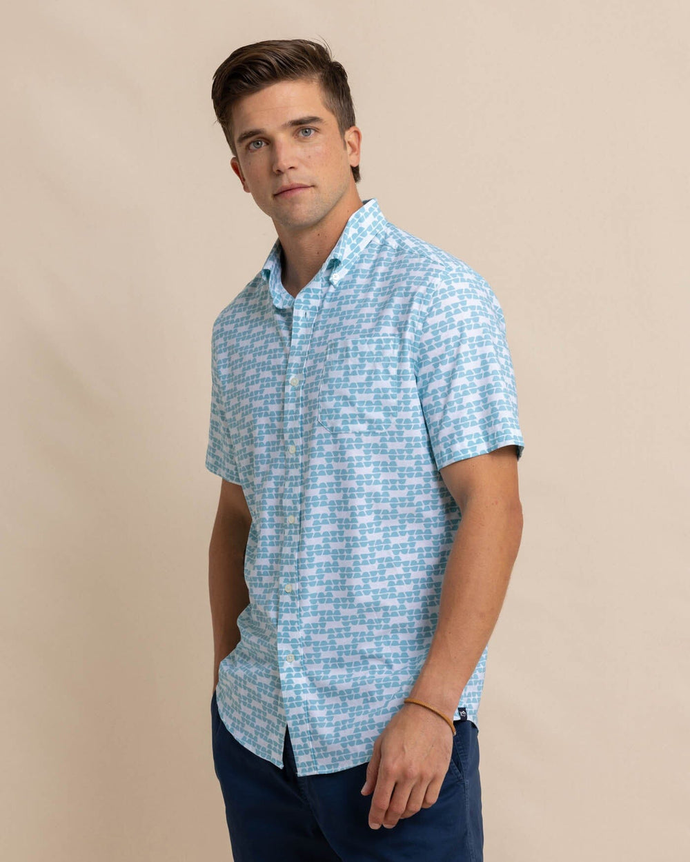 The front view of the Southern Tide brrr Intercoastal Heather Stay Shady Short Sleeve Sport Shirt by Southern Tide - Heather Wake Blue