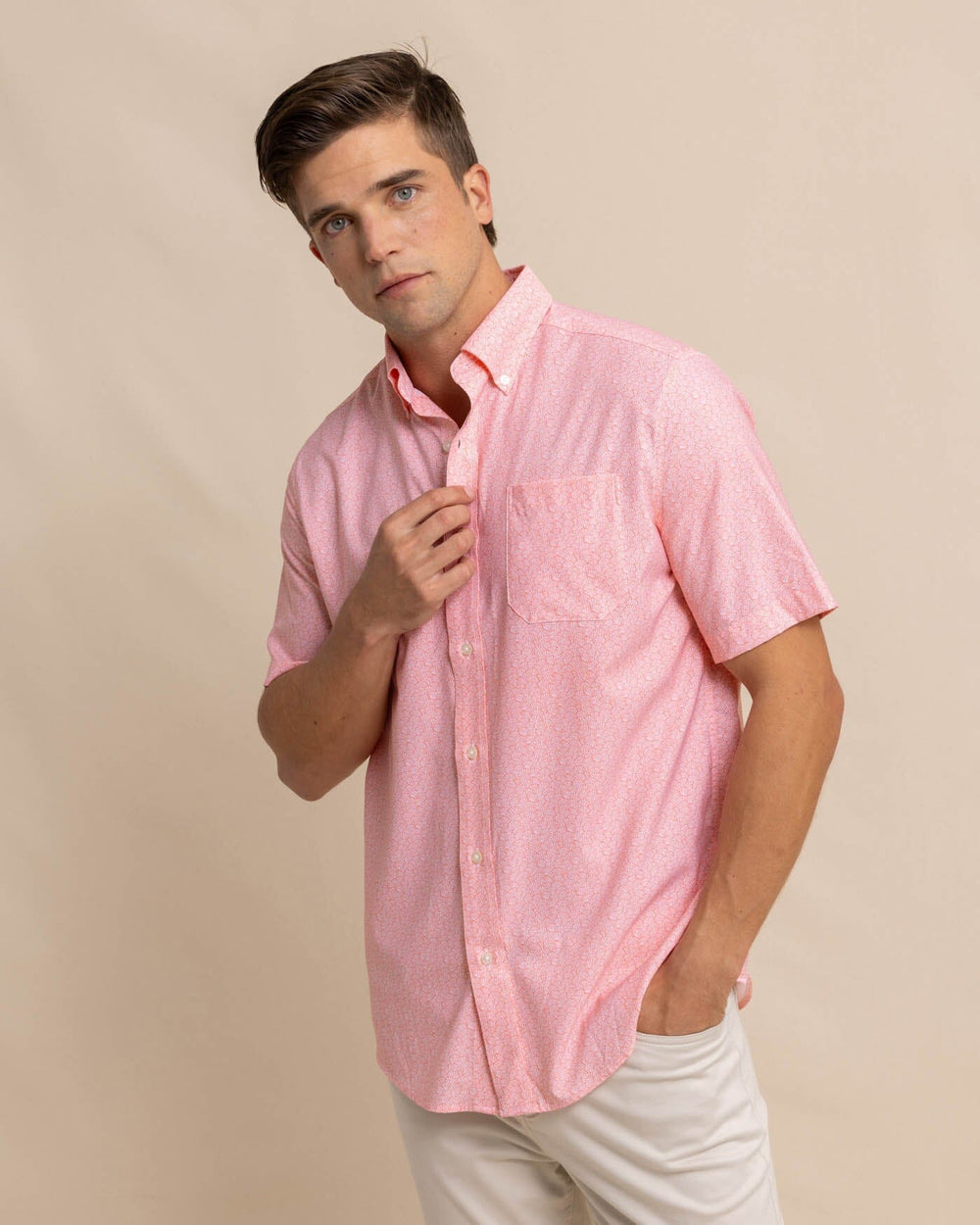 The front view of the Southern Tide brrr Intercoastal What the Shell Short Sleeve Sportshirt by Southern Tide - Conch Shell