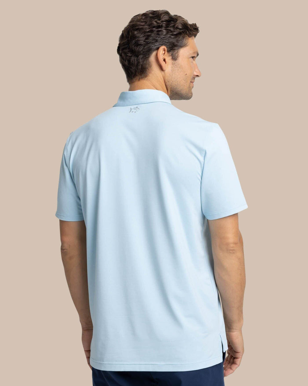 The back view of the Southern Tide brrr-eeze Heather Performance Polo Shirt by Southern Tide - Heather Dream Blue