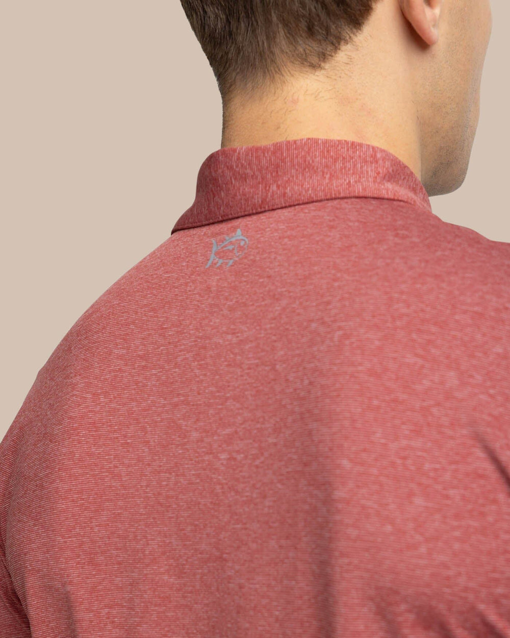 The yoke view of the Southern Tide brrr-eeze Heather Performance Polo Shirt by Southern Tide - Heather Tuscany Red