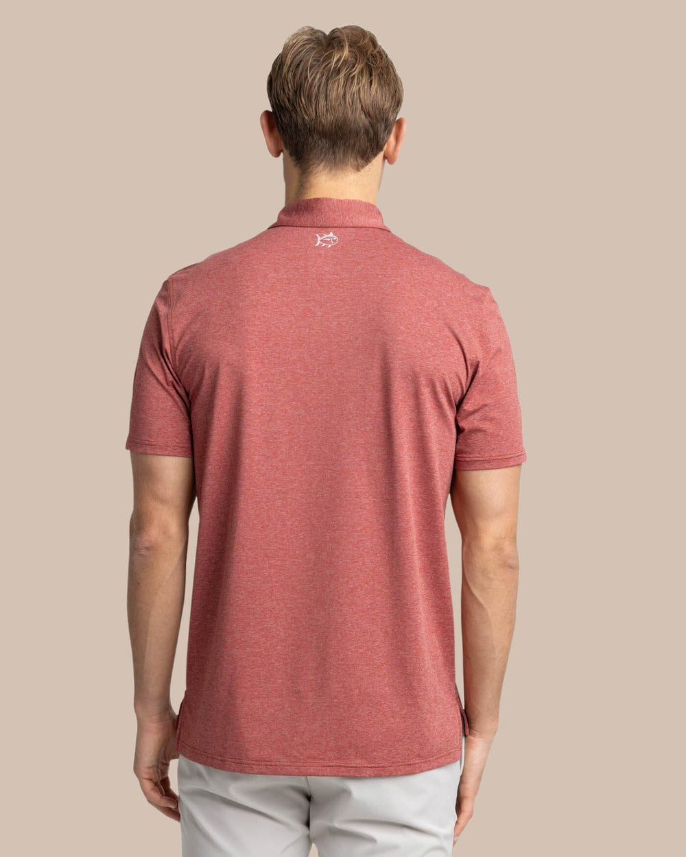 The back view of the Southern Tide brrr-eeze Heather Performance Polo Shirt by Southern Tide - Heather Tuscany Red