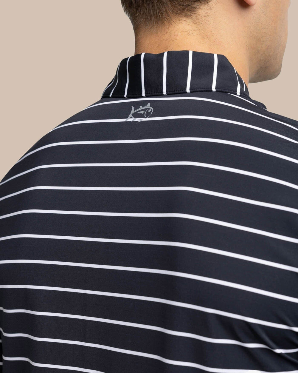 The yoke view of the Southern Tide brrr-eeze Desmond Stripe Performance Polo by Southern Tide - Black