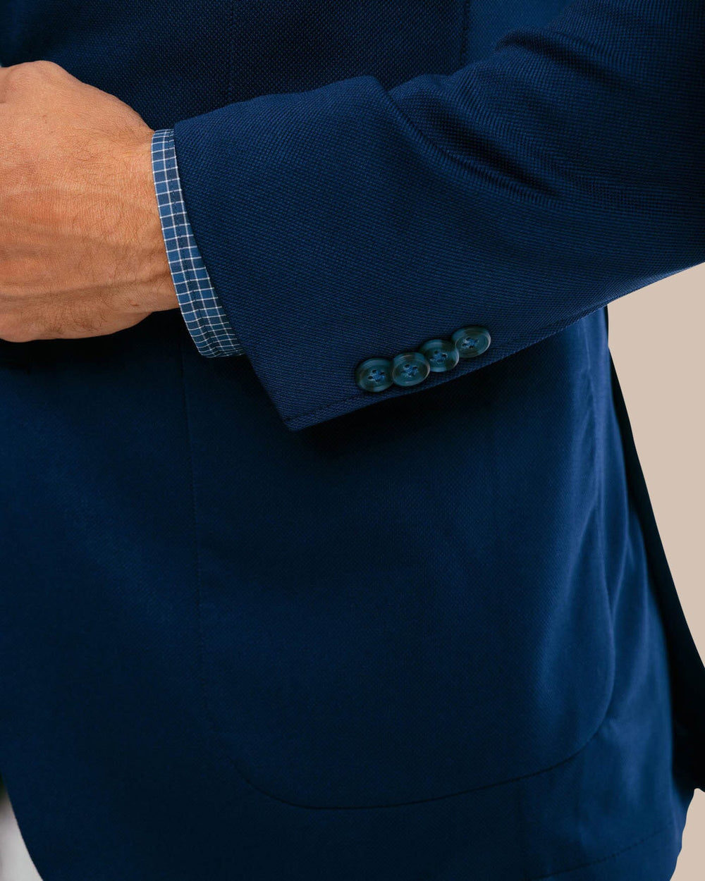 The sleeve of the Men's Charleston Navy Blazer by Southern Tide - Navy