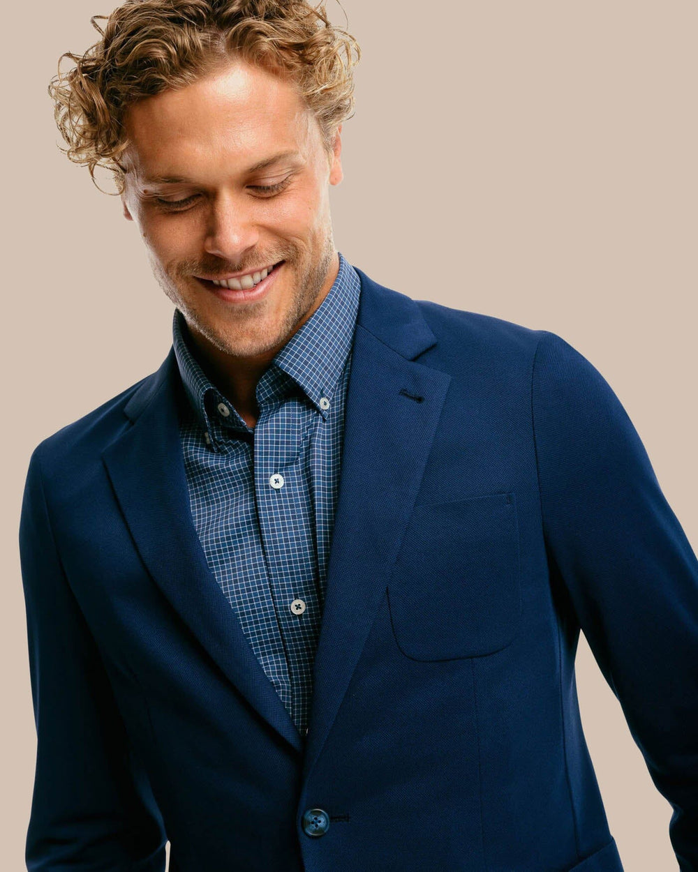 The collar of the Men's Charleston Navy Blazer by Southern Tide - Navy