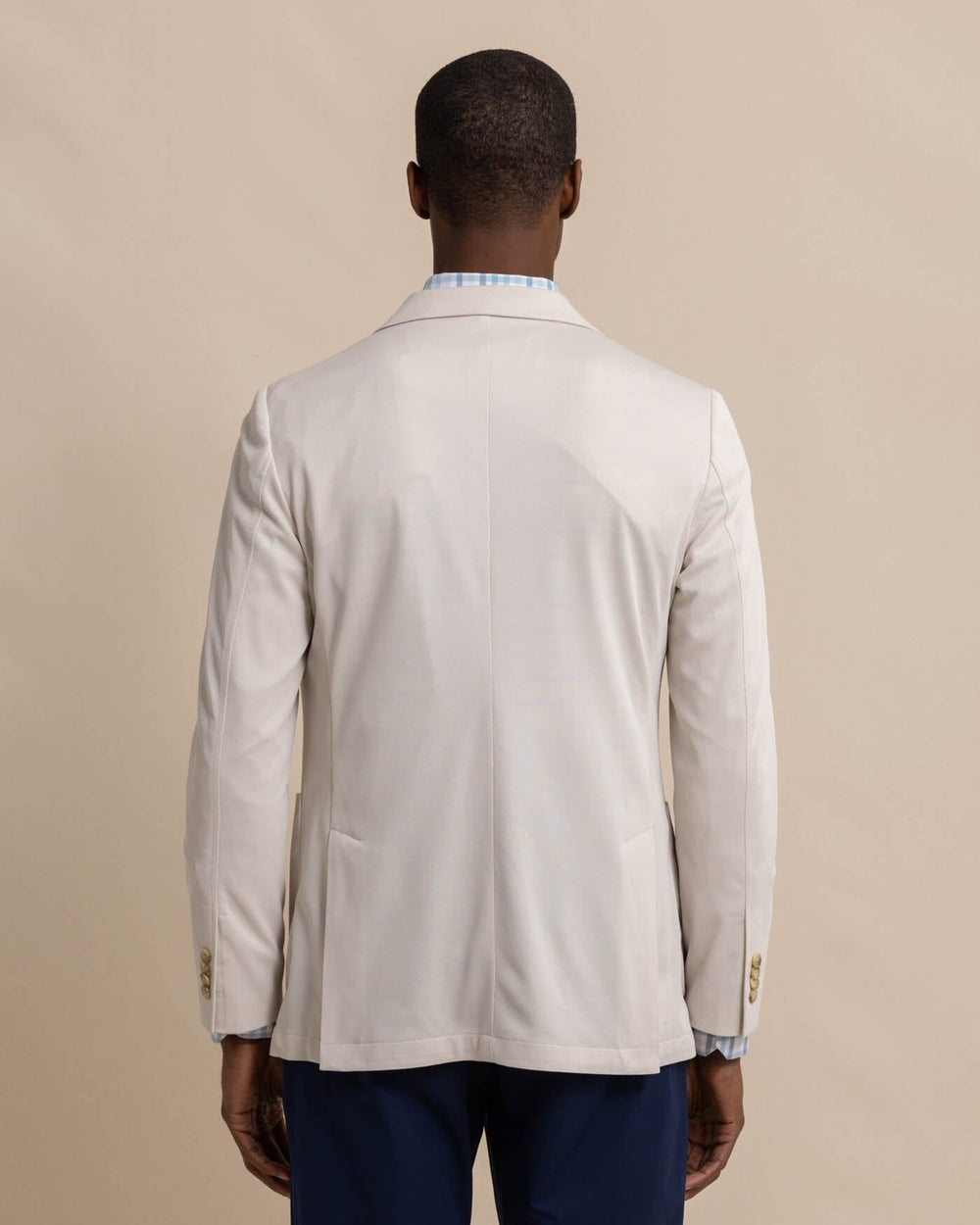 The back view of the Southern Tide charleston-navy-blazer by Southern Tide - Perfectly Pale Khaki