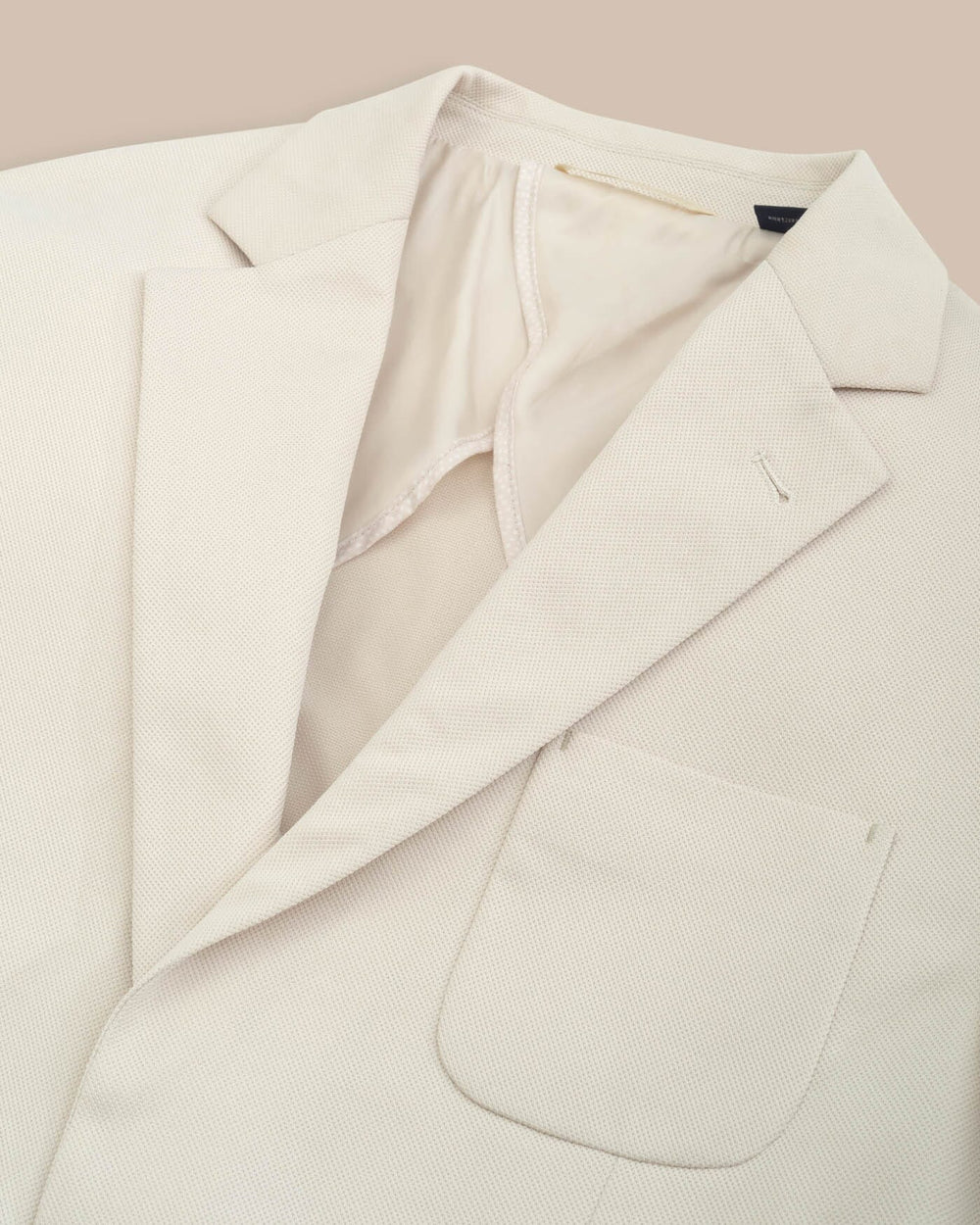 The detail view of the Southern Tide Charleston Navy Blazer by Southern Tide - Perfectly Pale Khaki