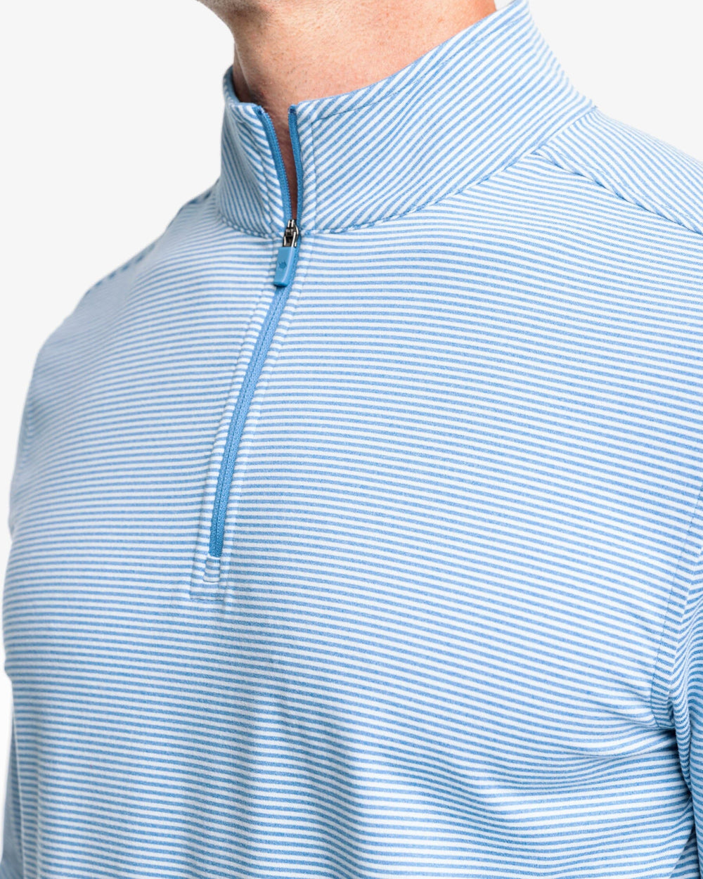 The detail view of the Southern Tide Cruiser Heather Micro-Stripe Performance Quarter Zip by Southern Tide - Heather Atlantic Blue