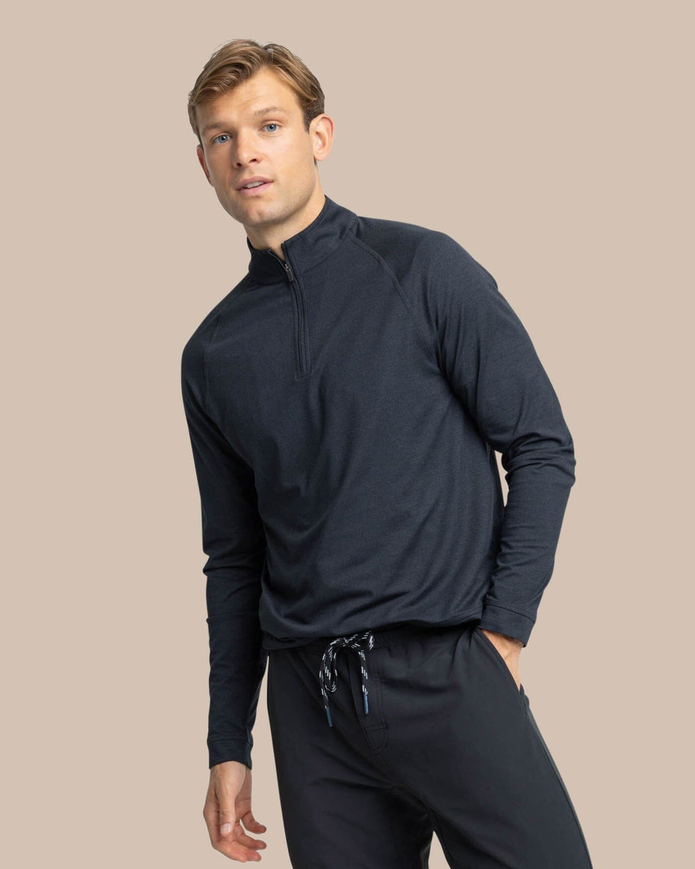 The front view of the Southern Tide Cruiser Heather Quarter Zip Pullover by Southern Tide - Heather Caviar Black