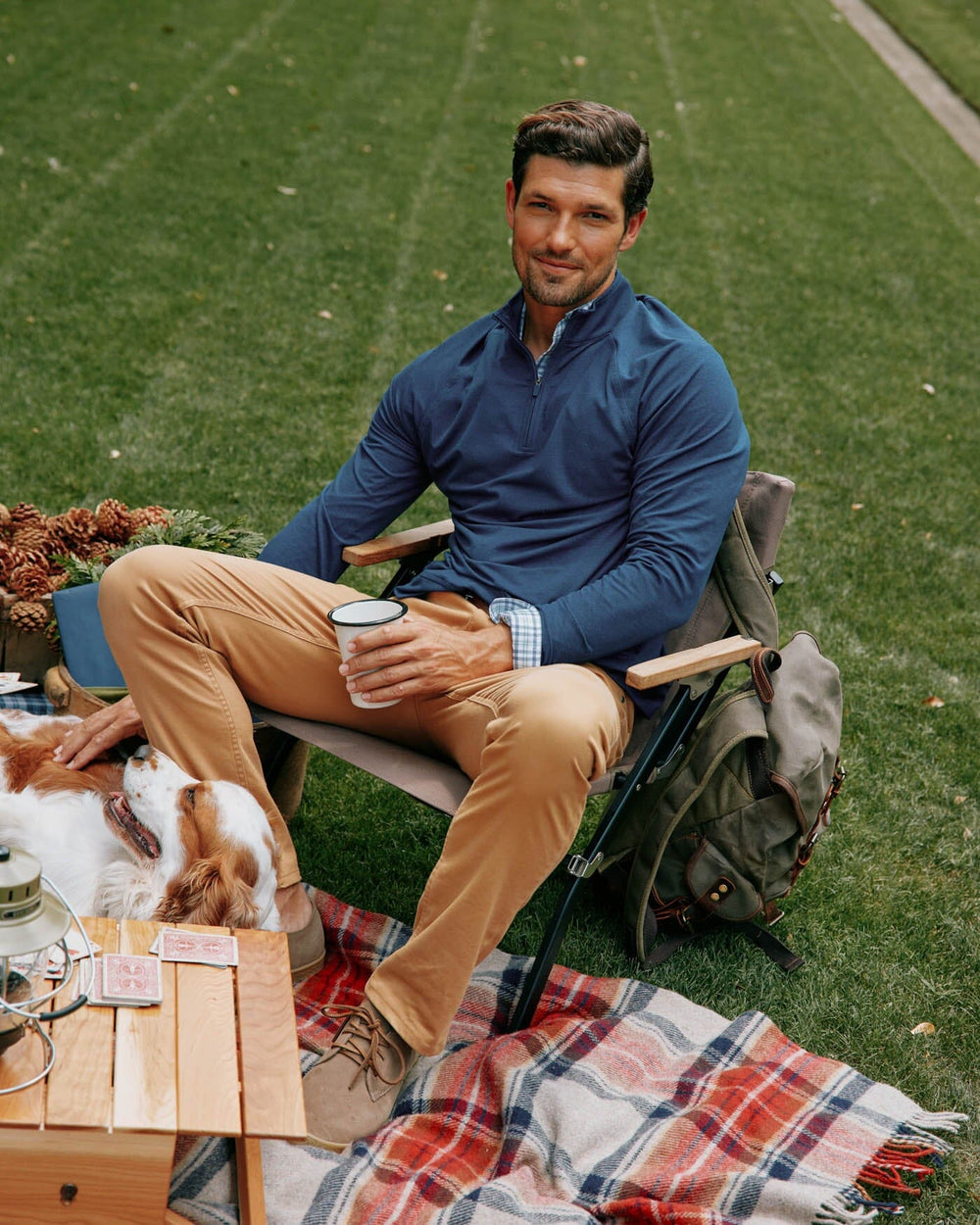 The front view of the Southern Tide Cruiser Heather Quarter Zip Pullover by Southern Tide - Heather Dress Blue
