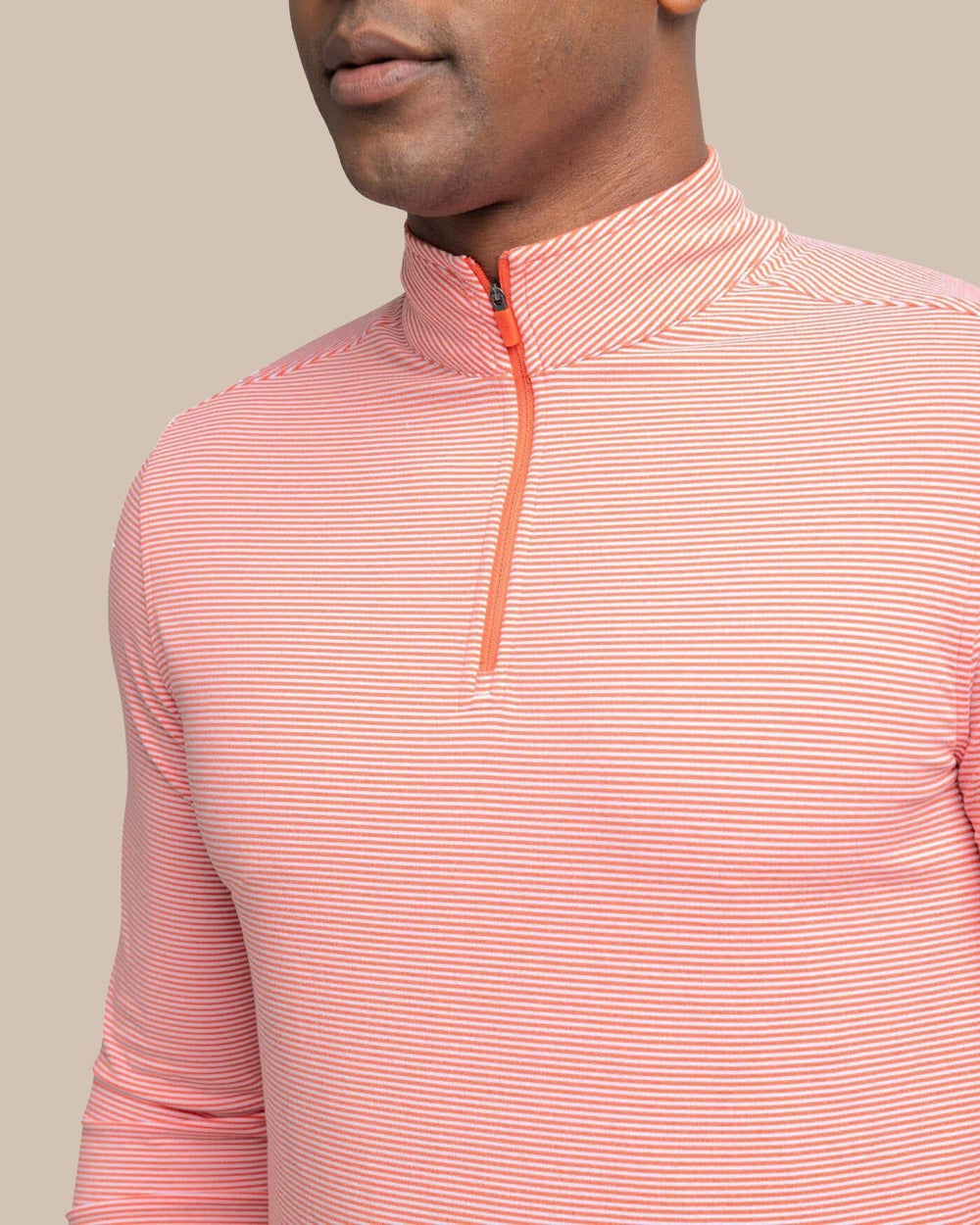 The detail view of the Southern Tide Cruiser Micro-Stripe Heather Quarter Zip by Southern Tide - Heather Endzone Orange