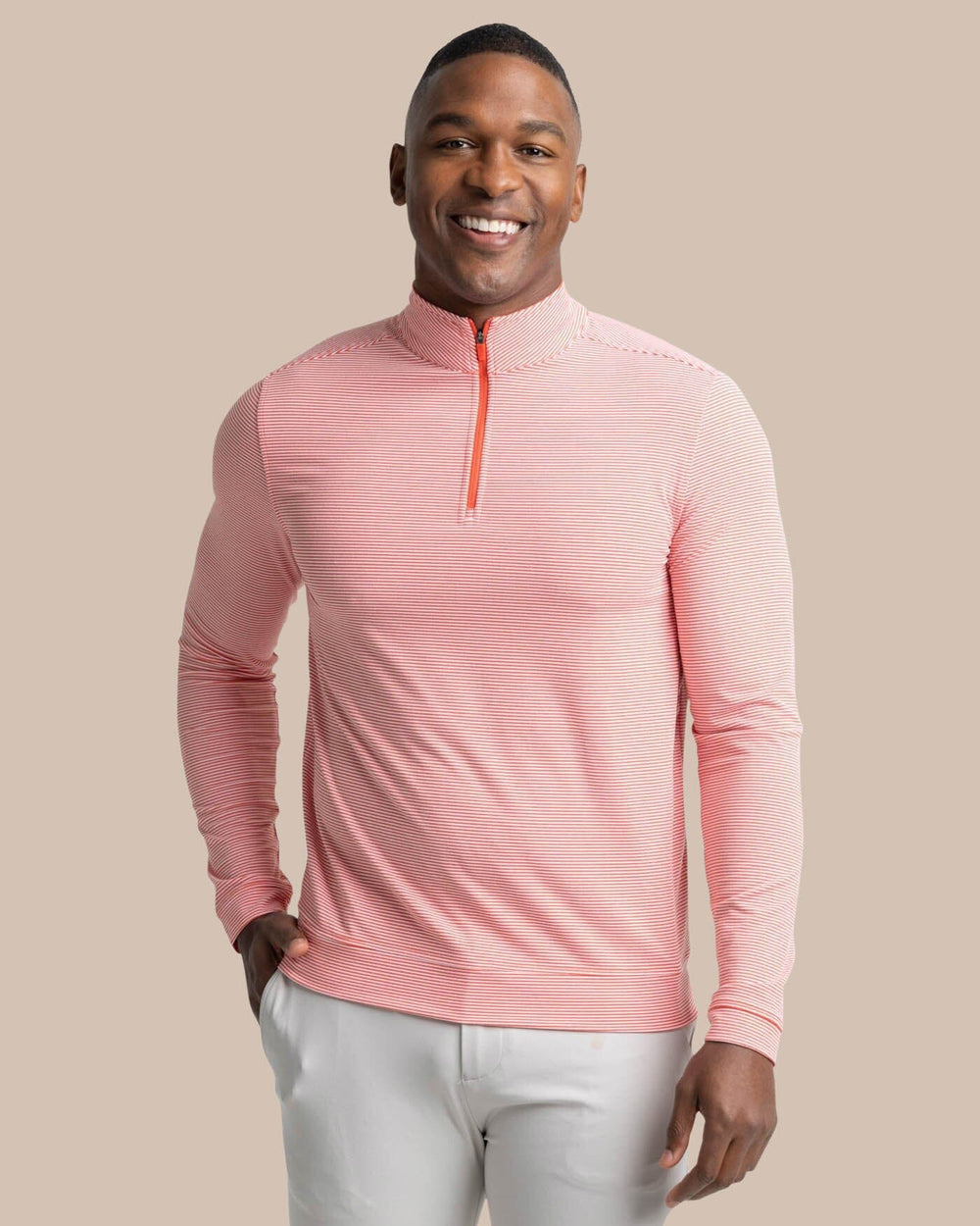 The front view of the Southern Tide Cruiser Micro-Stripe Heather Quarter Zip by Southern Tide - Heather Endzone Orange