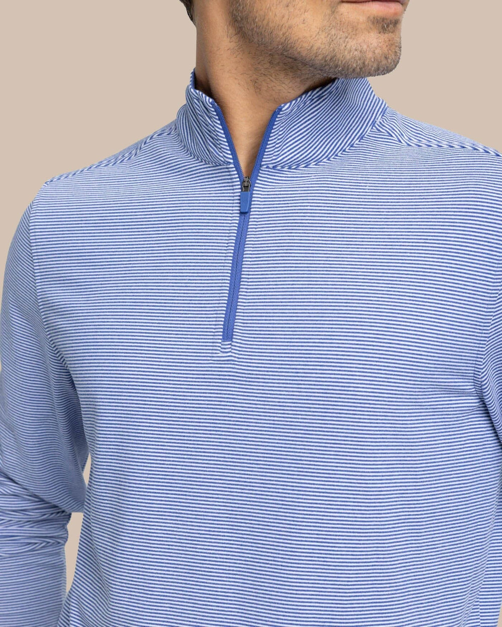 The detail view of the Southern Tide Cruiser Micro-Stripe Heather Quarter Zip by Southern Tide - Heather University Blue