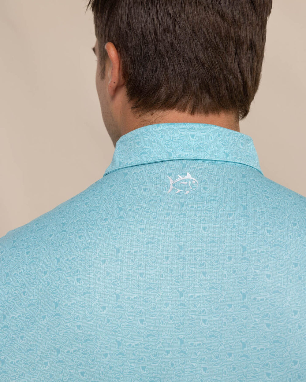 The detail view of the Southern Tide Driver Let's Go Clubbing Printed Polo by Southern Tide - Ocean Aqua