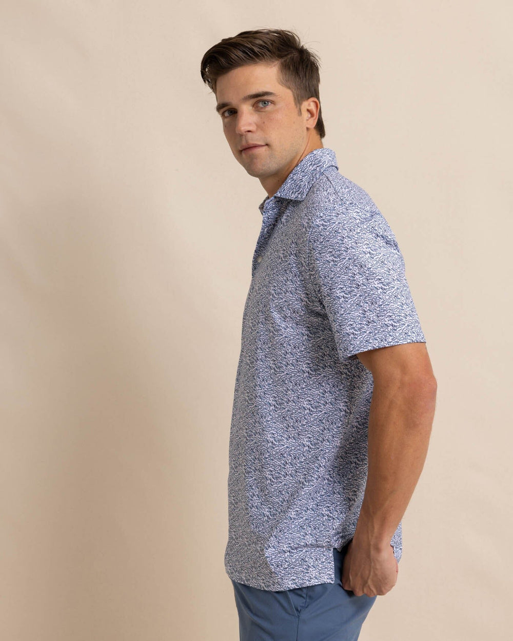 The front view of the Southern Tide Driver Schooling Fish Polo Shirt by Southern Tide - Classic White