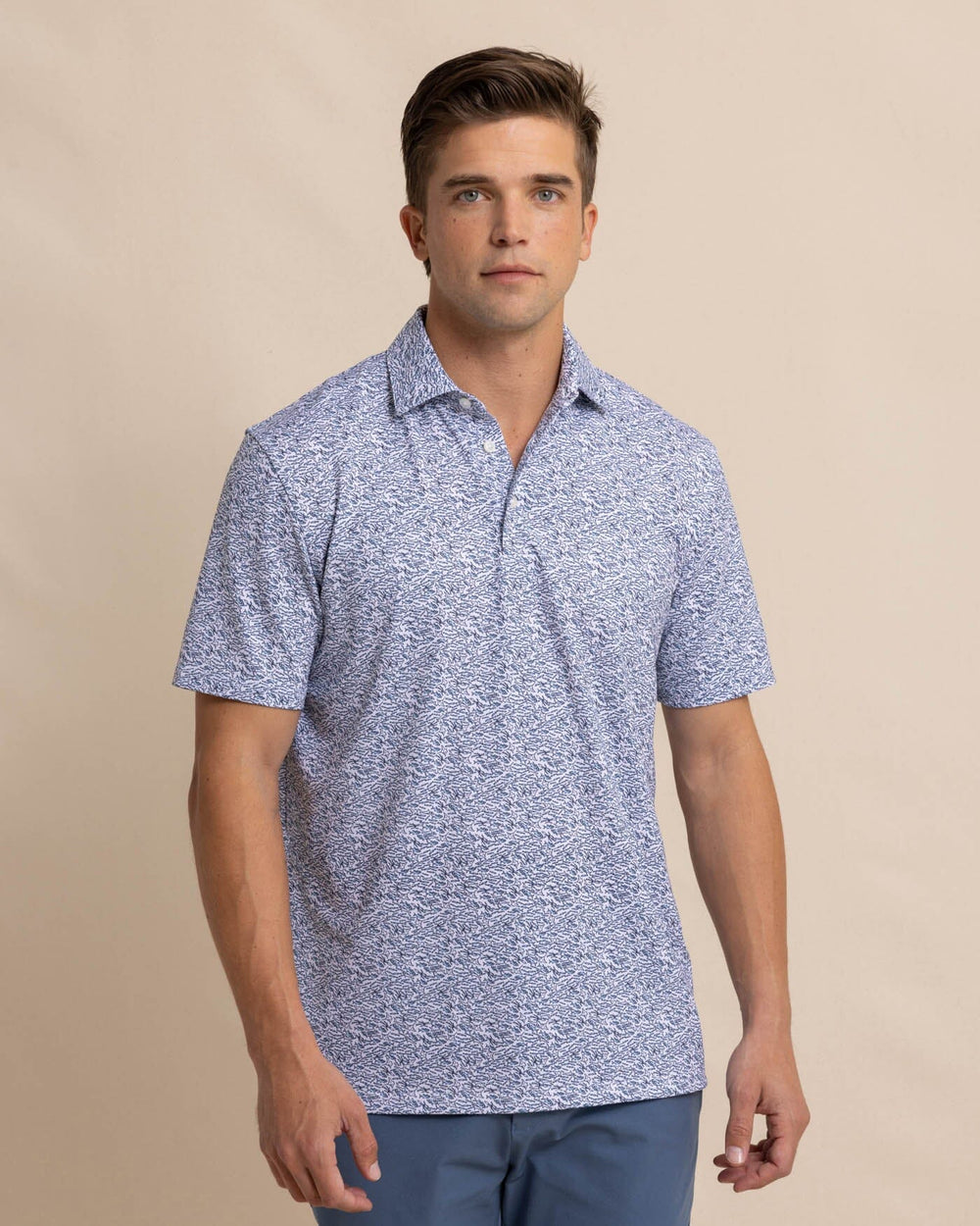 The front view of the Southern Tide Driver Schooling Fish Polo Shirt by Southern Tide - Classic White