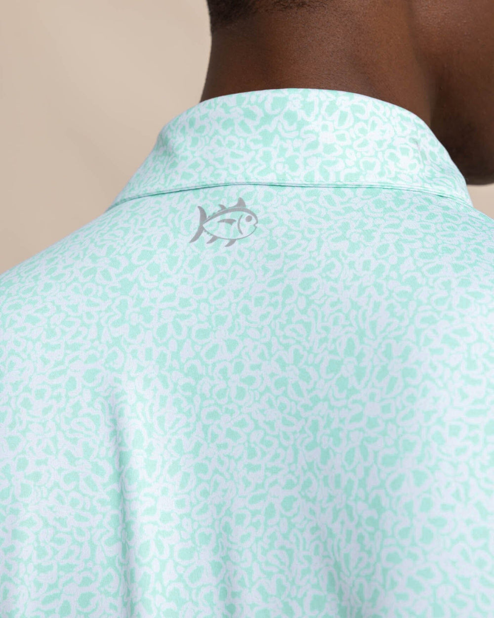 The detail view of the Southern Tide Driver That Floral Feeling Printed Polo by Southern Tide - Wake Blue