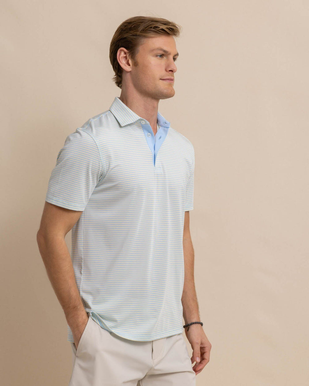 The front view of the Southern Tide Driver Verdae Stripe Polo by Southern Tide - Golden Haze Yellow