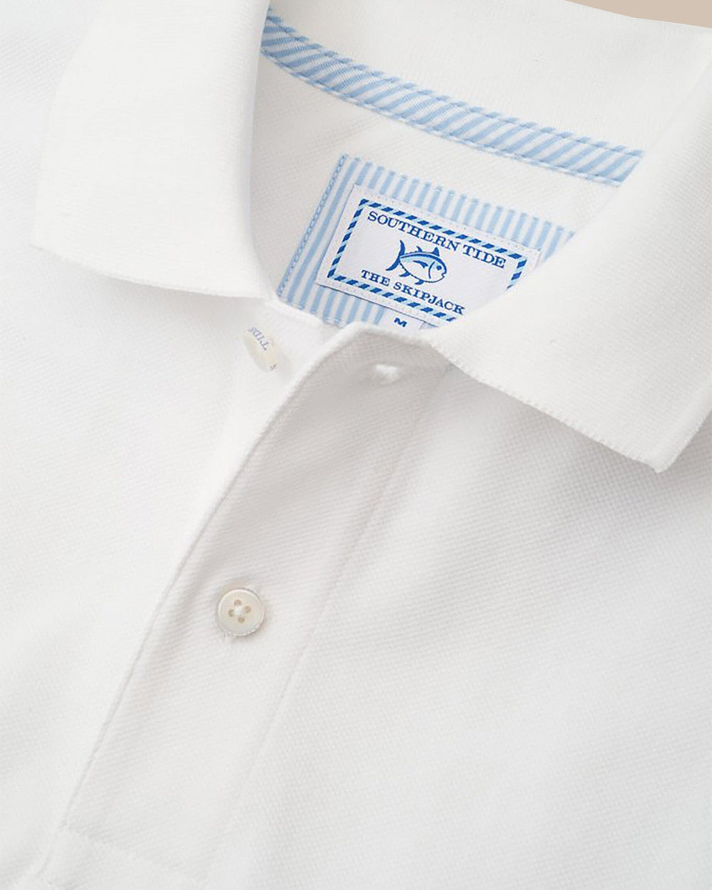 The front view of the Men's Orange Skipjack Gameday Colors Polo Shirt by Southern Tide - Classic White