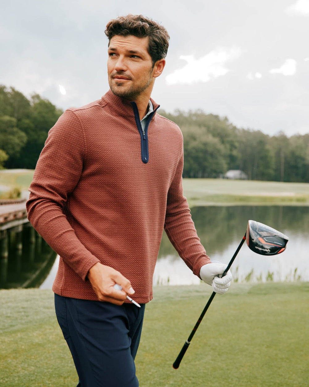 The front view of the Southern Tide Heather Outbound Quarter Zip by Southern Tide - Heather Bordeaux Red