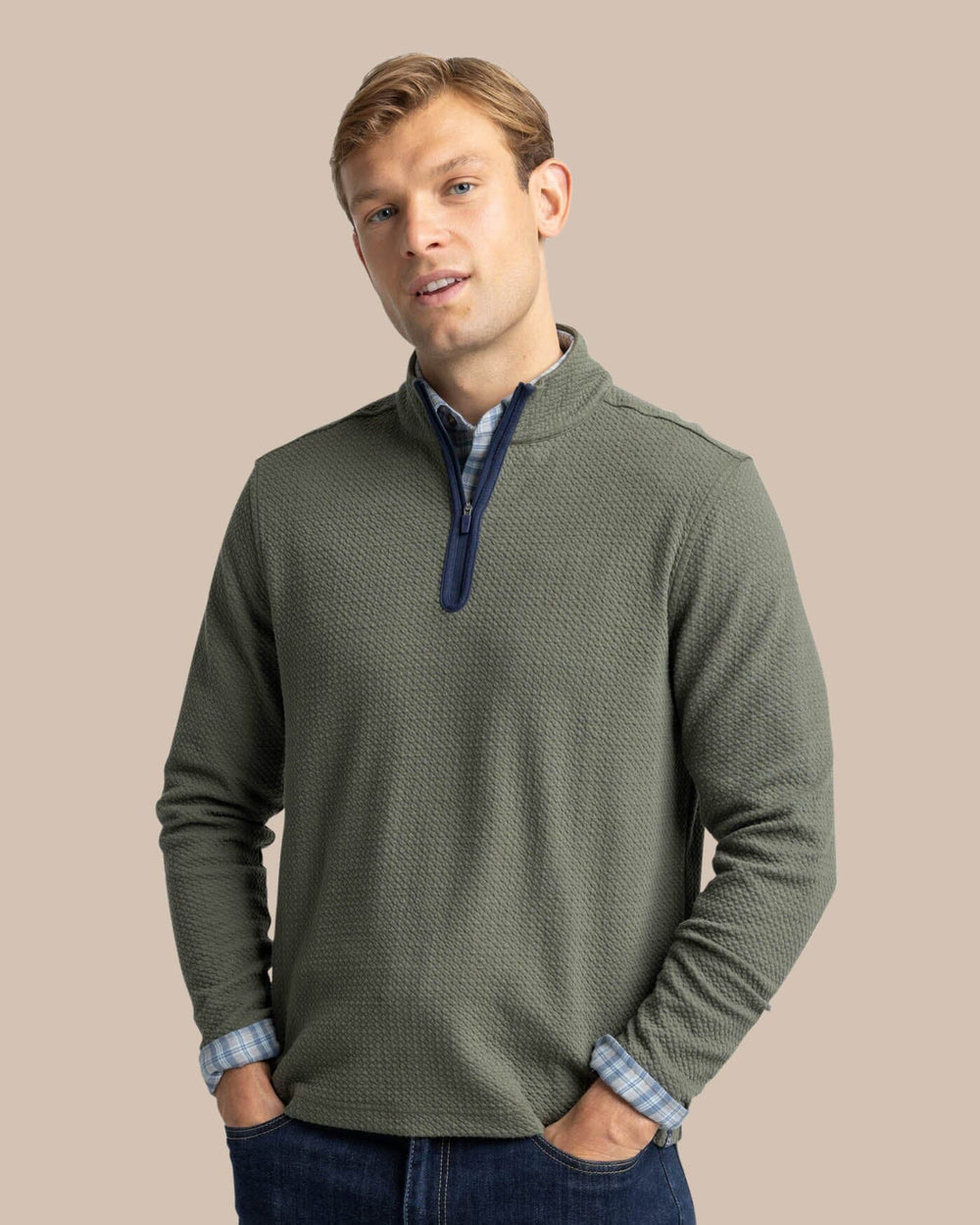 The front view of the Southern Tide Heather Outbound Quarter Zip by Southern Tide - Heather Gulf Green