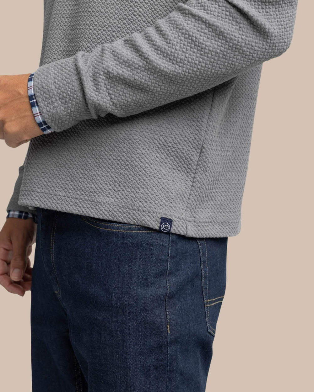 The detail view of the Southern Tide Heather Outbound Quarter Zip by Southern Tide - Heather Shadow Grey