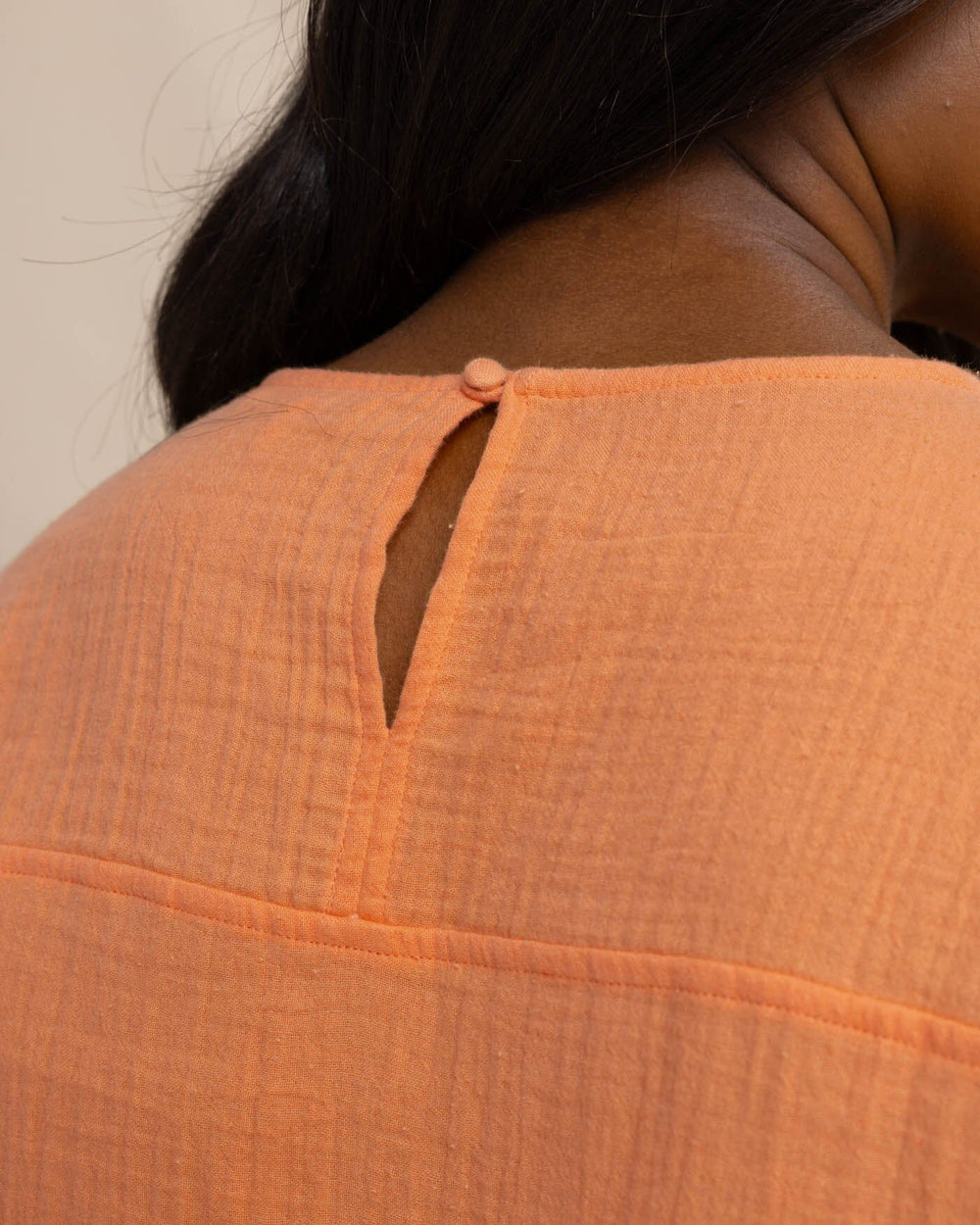 The detail view of the Southern Tide Imogen Double Cloth Top by Southern Tide - Peach Parfait