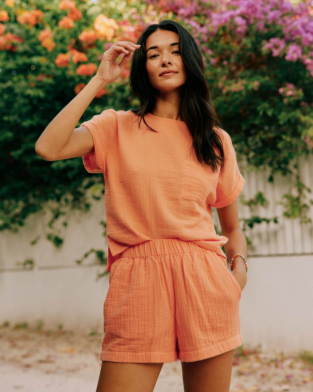 The front view of the Southern Tide Imogen Double Cloth Top by Southern Tide - Peach Parfait
