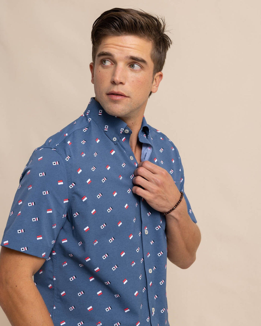 The front view of the Southern Tide Keep It Nautical Intercoastal Heather Short Sleeve Sportshirt by Southern Tide - Heather Aged Denim