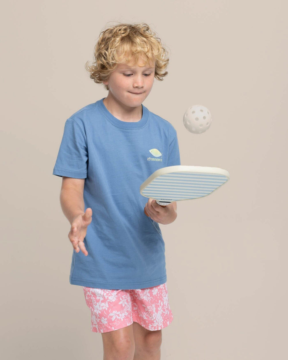 The front view of the Southern Tide Youth Skipjack Lure Fill Short Sleeve T-shirt by Southern Tide - Coronet Blue