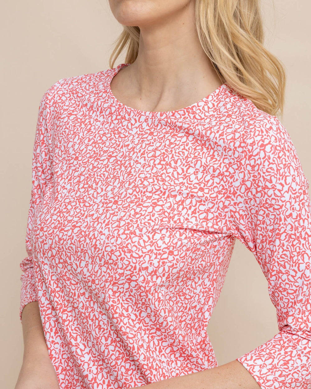 The detail view of the Southern Tide Leira That Floral Feeling Print Performance Dress by Southern Tide - Conch Shell