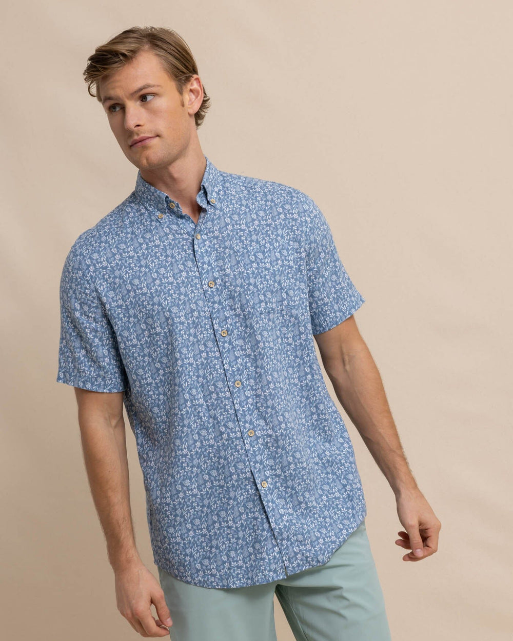 The front view of the Southern Tide Linen Rayon Ditzy Floral Short Sleeve Sport Shirt by Southern Tide - Coronet Blue