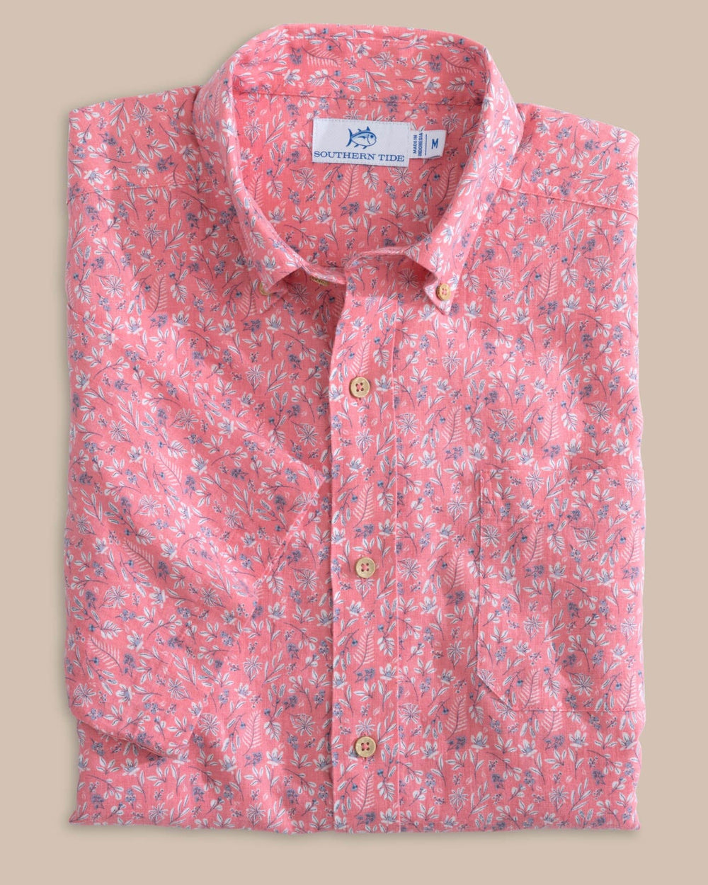 The front view of the Southern Tide Linen Rayon Ditzy Floral Short Sleeve Sport Shirt by Southern Tide - Geranium Pink
