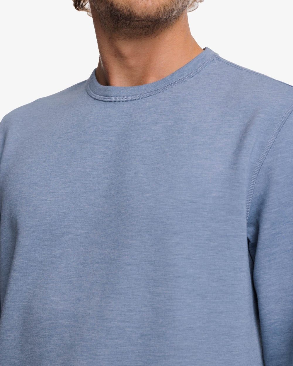 The detail view of the Southern Tide Lockley Heather Interlock Crew by Southern Tide - Heather Blue Haze
