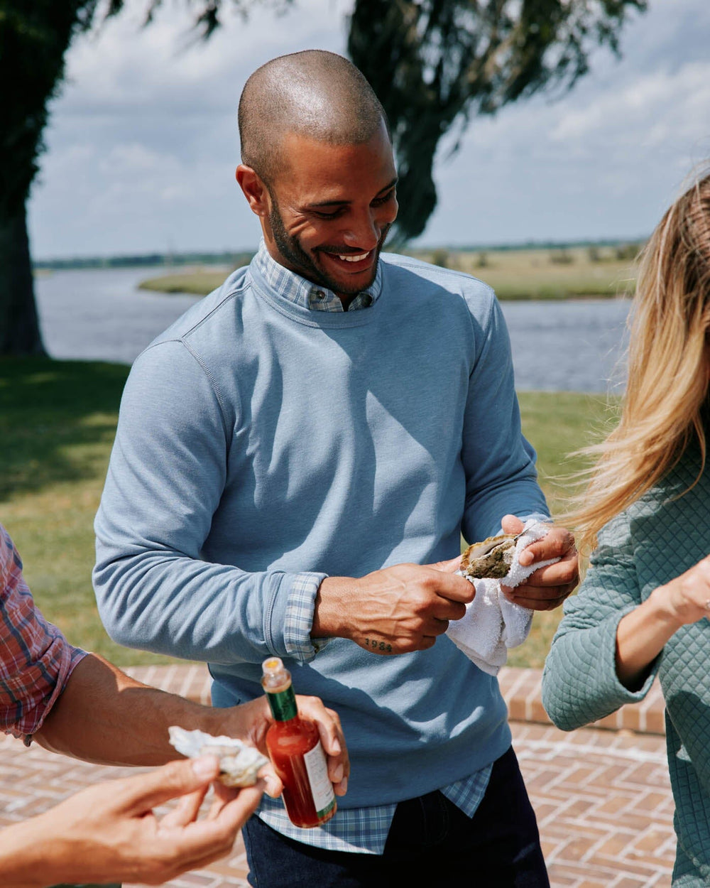 The front view of the Southern Tide Lockley Heather Interlock Crew by Southern Tide - Heather Blue Haze