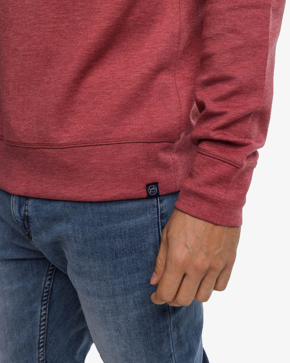 The detail view of the Southern Tide Lockley Heather Interlock Crew by Southern Tide - Heather Tuscany Red