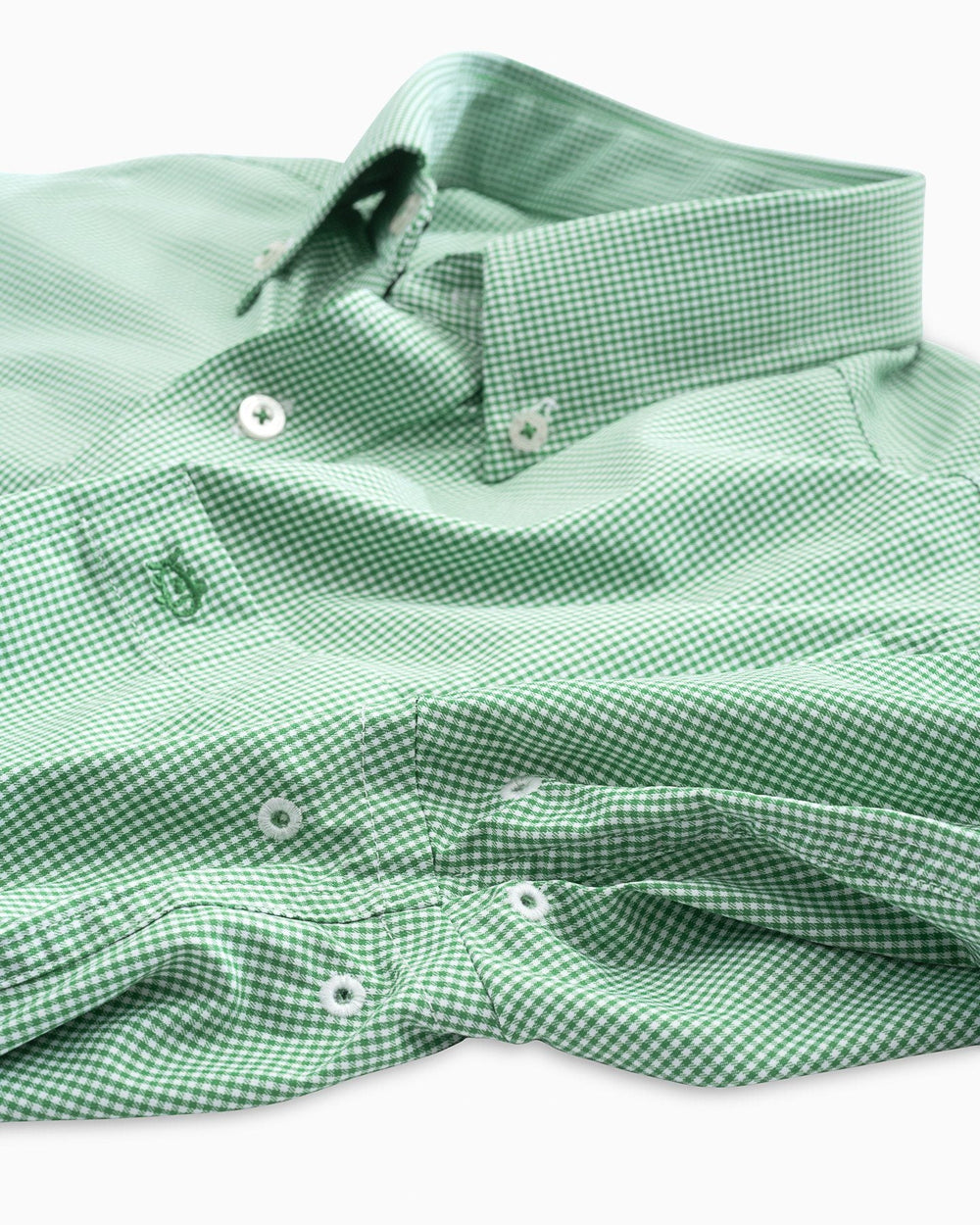 Arm vents of the Men's Green Micro Gingham Intercoastal Performance Sport Shirt by Southern Tide - surf green