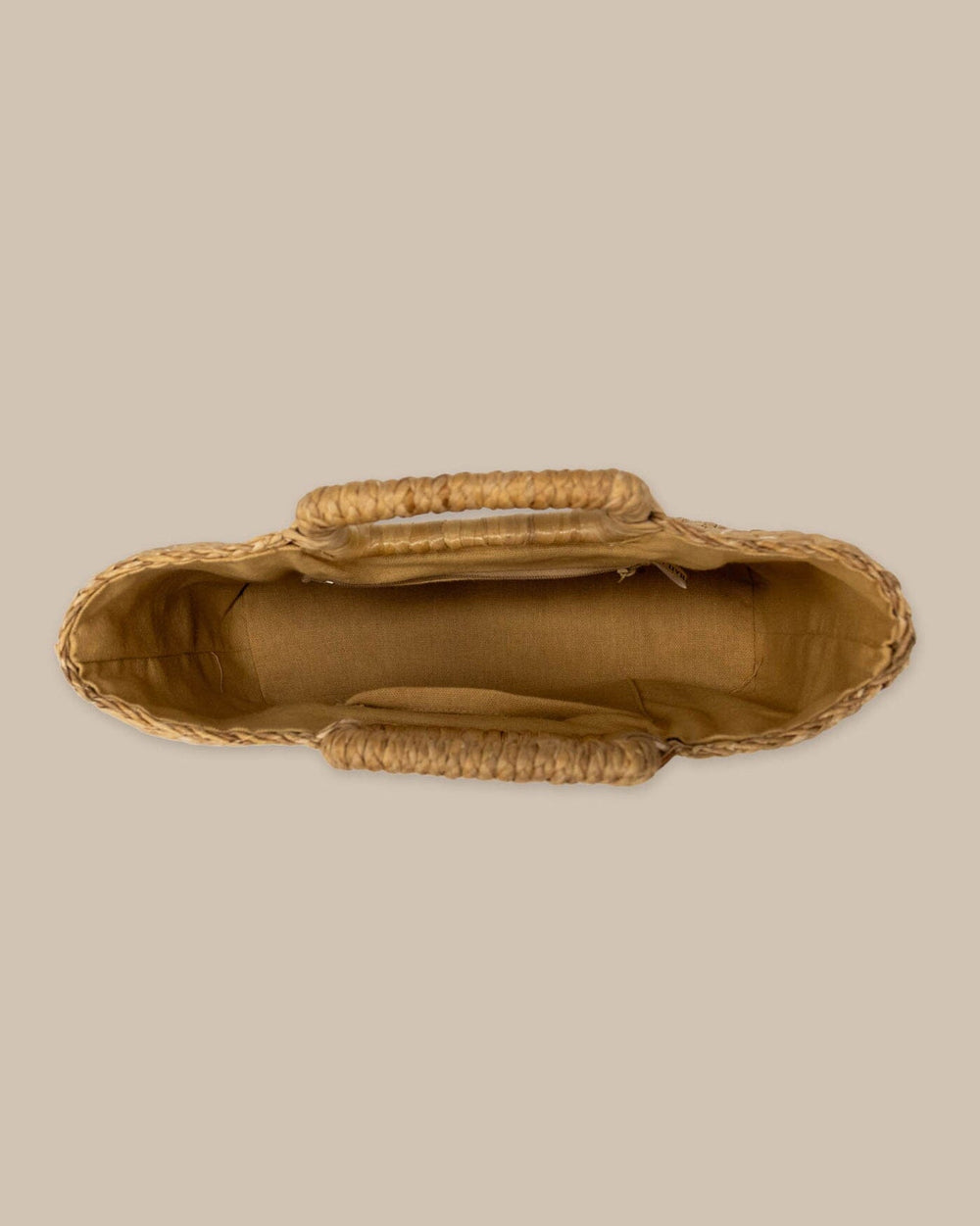 The detail view of the Southern Tide Mini Straw Bag by Southern Tide - Natural